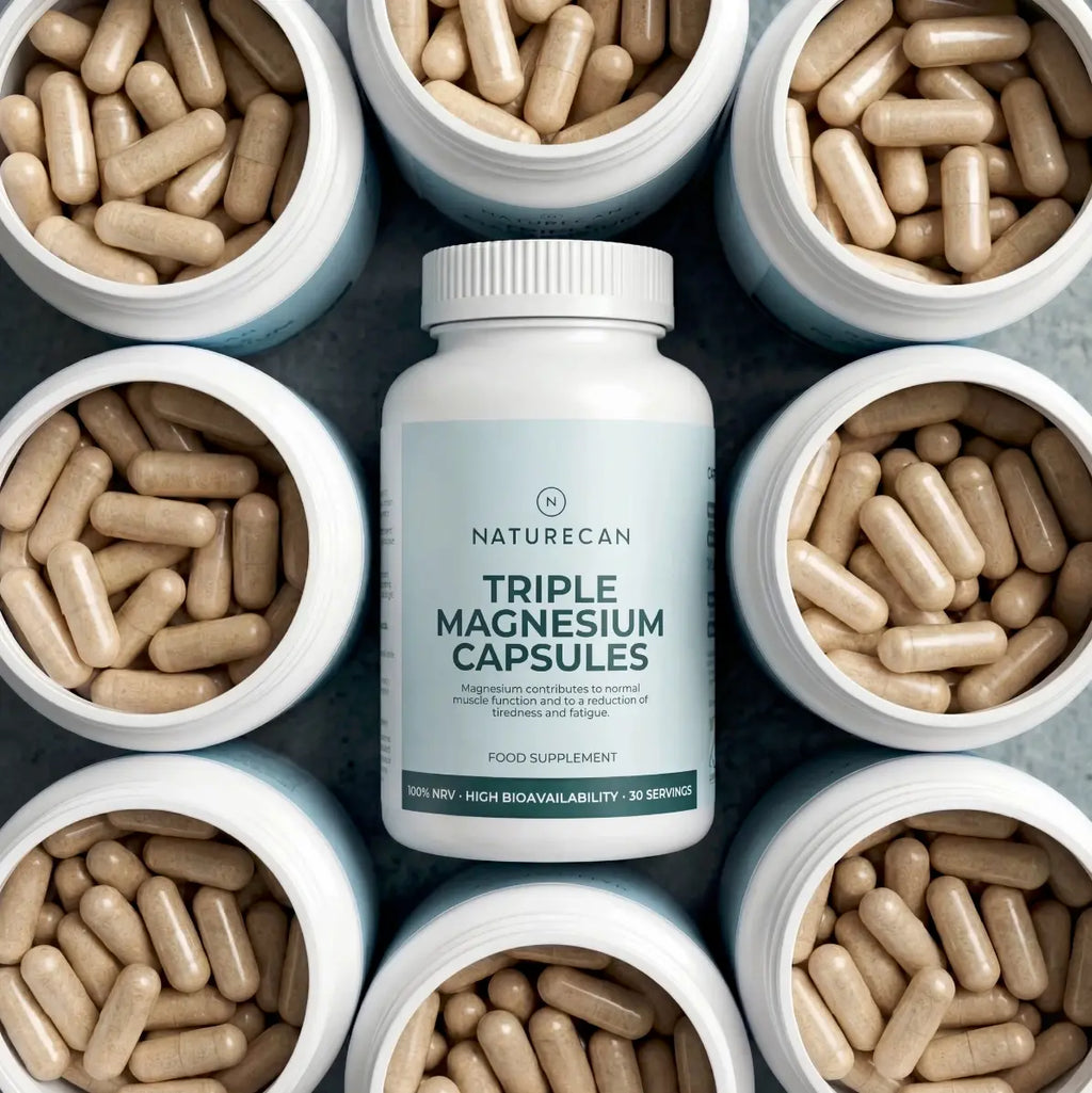 Opakowanie kapsułek Triple Magnesium Naturecan otoczone kapsułkami – kompleks magnezu: glicynian, jabłczan i mleczan